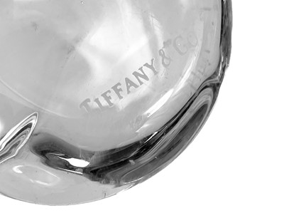 Lot 22 - A collection of decorative glassware to include a Tiffany & Co paperweight.