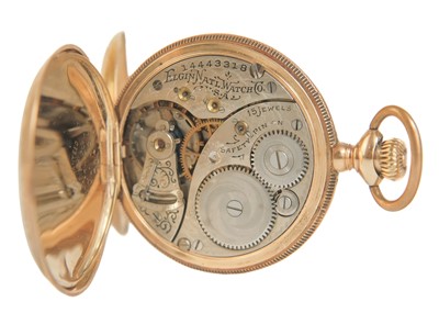 Lot 39 - An Elgin 14ct full hunter crown wind fob pocket watch, within a gilt tooled leather travel case.