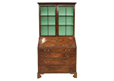Lot 579 - A George III mahogany bureau bookcase.