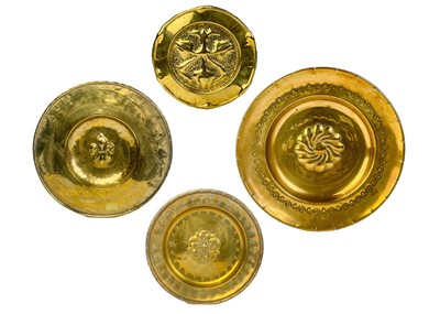 Lot 128 - A large brass circular alms dish.