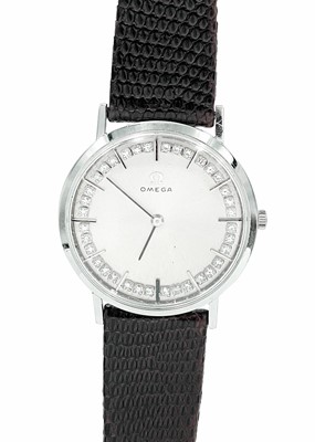 Lot 156 - OMEGA - A 14ct white gold diamond set gentleman's manual wind dress watch.