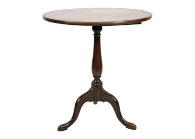 Lot 52 - A Georgian mahogany circular tilt top tripod table.
