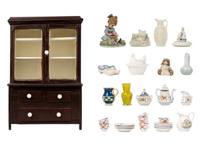 Lot 1040 - An early 20th century miniature dresser.