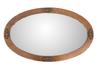 Lot 475 - An Arts and Crafts copper frame oval mirror.