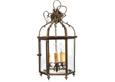 Lot 79 - A bronze finished glazed hexagonal hall lantern.
