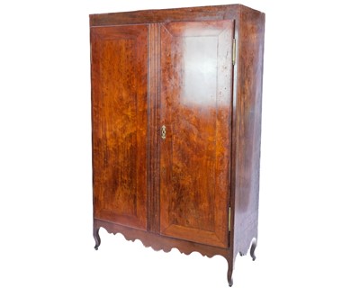 Lot 666 - An early 20th century French fruit wood wardrobe.