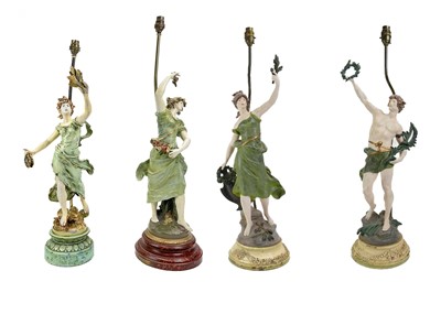 Lot 87 - A pair of early 20th century painted spelter table lamps.