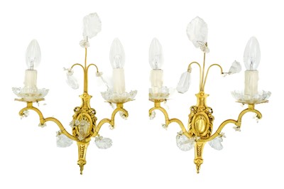 Lot 477 - A pair of gilt metal twin branch wall lights.