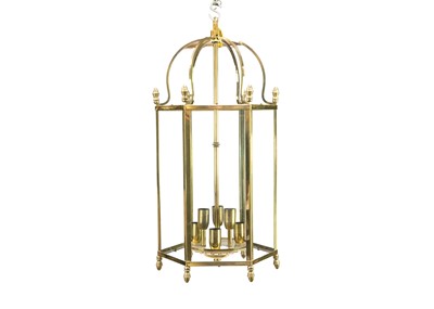 Lot 469 - A glazed brass hexagonal hall lantern.