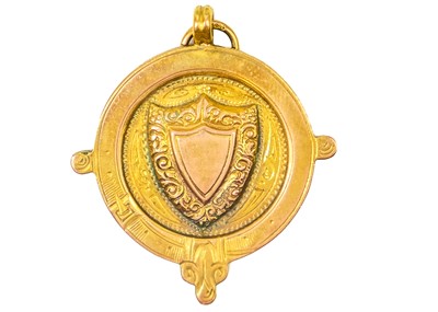 Lot 96 - A 9ct gold shield fob.