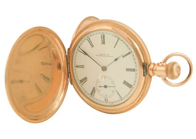 Lot 10 - A Waltham 'Ensign' rose gold plated full hunter slim cased lever pocket watch.