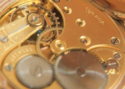Lot 41 - OMEGA - A gold-plated open face crown wind lever pocket watch.