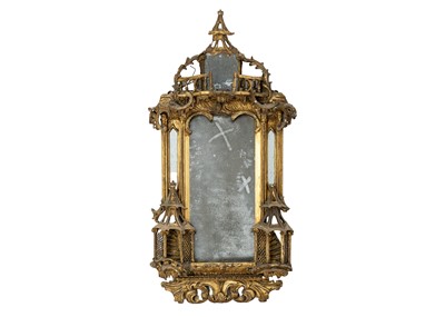 Lot 481 - A George III gilt gesso and carved wood wall mirror.