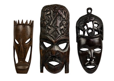 Lot 198 - An African tribal carved mask.