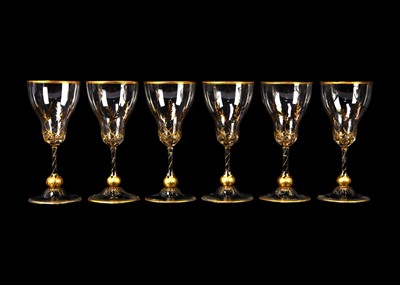 Lot 435 - A set of six gilt decorated sherry glasses.