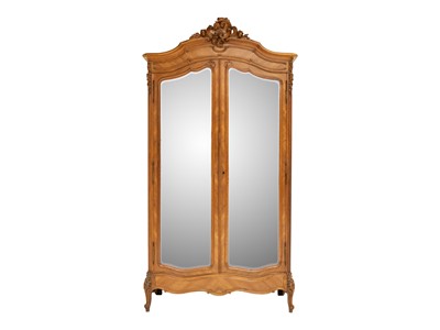Lot 640 - A French walnut armoire.