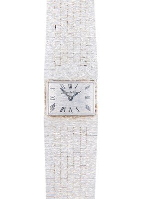Lot 110 - BUECHE-GIROD - A 9ct white gold lady's manual wind bracelet wristwatch.