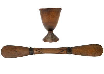 Lot 191 - An African carved chalice or libation cup.