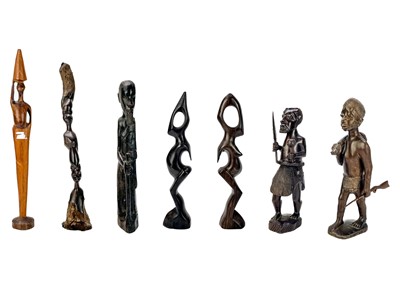 Lot 236 - An African hardwood carved figure of a hunter.