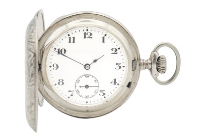 Lot 21 - A silver-cased full hunter crown wind Swiss lever pocket watch.