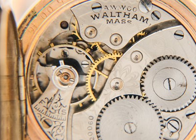 Lot 38 - WALTHAM - A rose gold plated full hunter crown wind fob pocket watch.