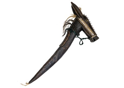Lot 111 - An African wood and brass bound hobby horse.