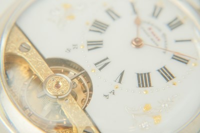 Lot 35 - A silver cased crown wind pocket watch with visible escapement dial.