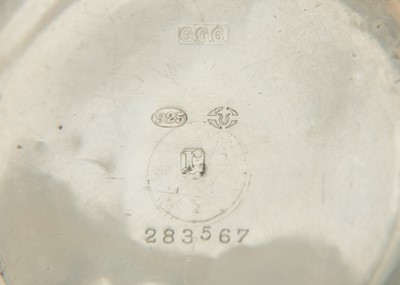 Lot 35 - A silver cased crown wind pocket watch with visible escapement dial.