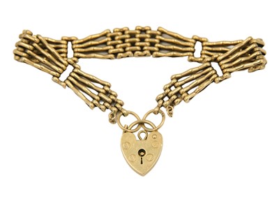 Lot 21 - A 9ct heavy four bar gatelink bracelet with padlock clasp.
