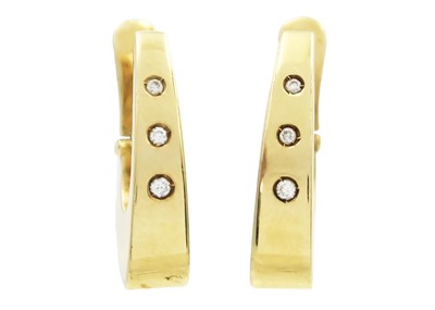 Lot 64 - A pair of 18ct diamond set stud and clip hoop earrings.