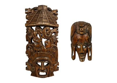 Lot 227 - An Aztec style carved wood mask.