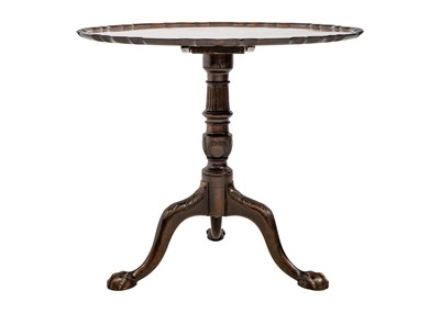 Lot 587 - George III style mahogany pie crust tilt top tripod table.