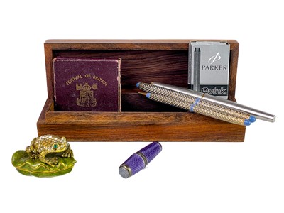 Lot 47 - An early 20th century silver and purple guilloche enamel etui.