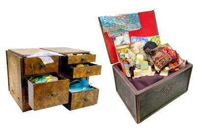 Lot 104 - A Japanese cabinet containing a large collection of buttons.