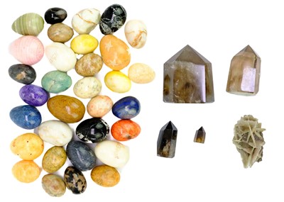 Lot 61 - A collection of egg-shaped minerals.