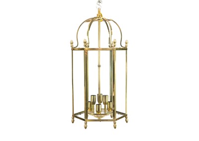 Lot 474 - A glazed brass hexagonal hall lantern.