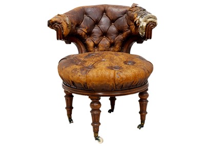 Lot 1675 - A Victorian leather bow back armchair.