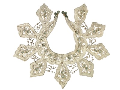 Lot 515 - A 19th century, possibly Hungarian, lace and metal bead embroidered collar.