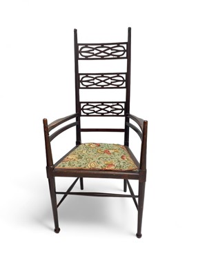 Lot 1558 - An Arts and Crafts mahogany armchair.