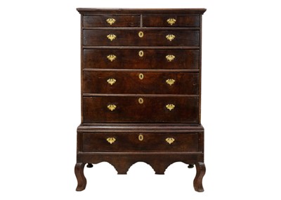 Lot 1165 - A George II oak chest on stand.