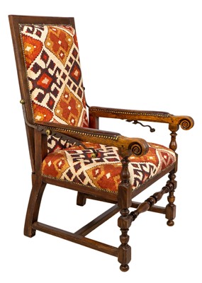 Lot 1019 - A 19th century French oak reclining armchair.