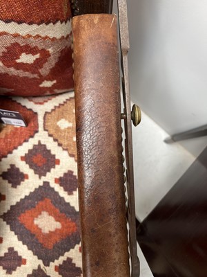 Lot 1019 - A 19th century French oak reclining armchair.
