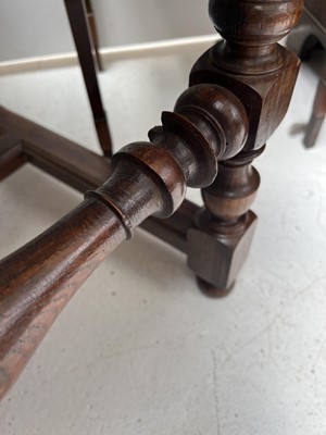 Lot 1019 - A 19th century French oak reclining armchair.