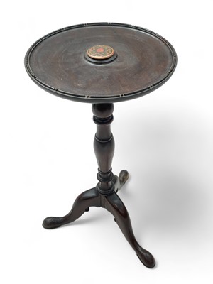 Lot 1671 - A mahogany tripod table with lazy susan top.