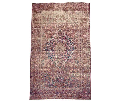 Lot 601 - An antique Persian Kerman rug.