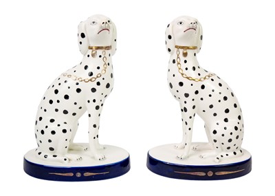 Lot 1013 - A Staffordshire pottery russet spaniel.