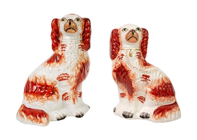 Lot 1013 - A Staffordshire pottery russet spaniel.