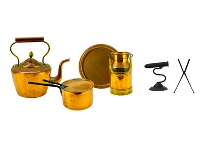 Lot 1015 - A large Victorian copper saucepan and cover.