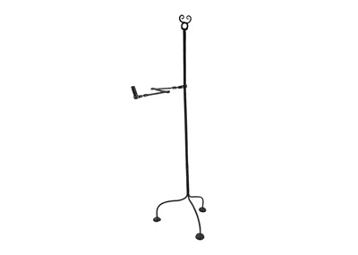 Lot 1131 - A rustic wrought iron primitive candle standard.