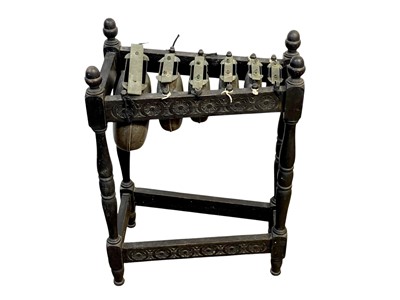 Lot 31 - An oak framed xylophone or metallophone.